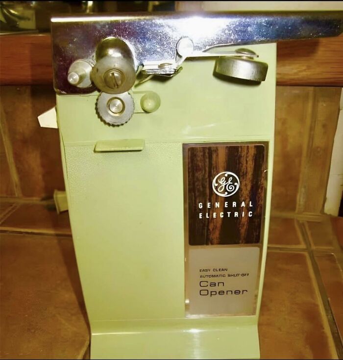 Retro avocado green General Electric electric can opener, part of nostalgic photos from 80s kids childhoods.