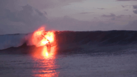 Surfers Set The Sea on Fire With Flares