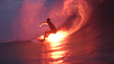Surfers Set The Sea on Fire With Flares