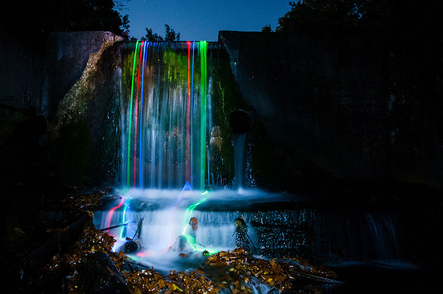 What Happens When You Throw Some Glow Sticks into a Waterfall