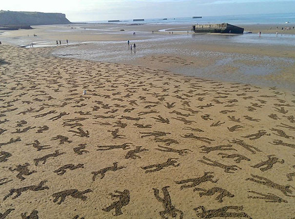 9,000 Fallen Soldier Sand Drawings Commemorate Those Who Died On D-Day Beach